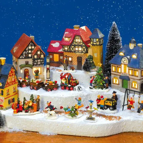 Expansive Village with Moving Train and Figures — Christmas Village Display
