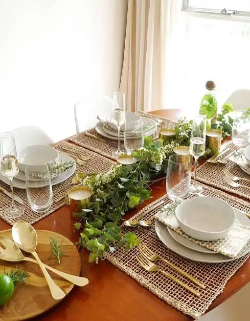 Modern Dining Room with Neutral Placemats and Greenery Runner — Christmas Table Setting