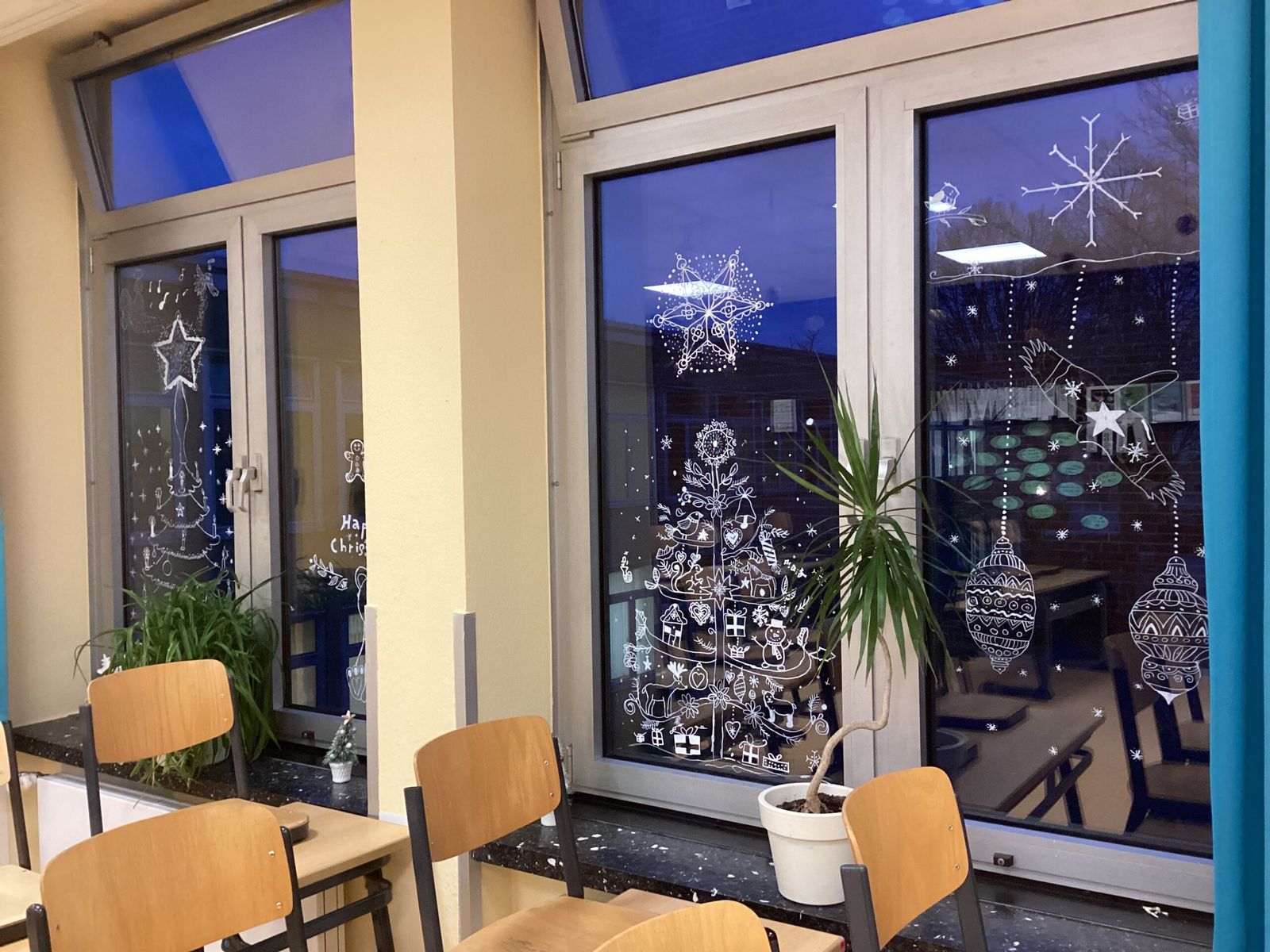 Snowflake and Christmas Tree Drawings on Classroom Windows Snowflake and Christmas Tree Drawings on Classroom Windows — Christmas Classroom Decor