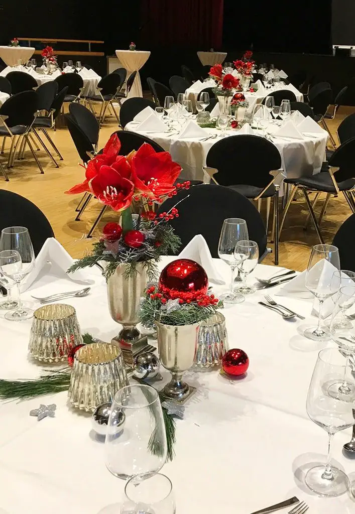 Classic Elegant Event Space with Red Amaryllis Arrangements Classic Elegant Event Space with Red Amaryllis Arrangements — Christmas Party Decor