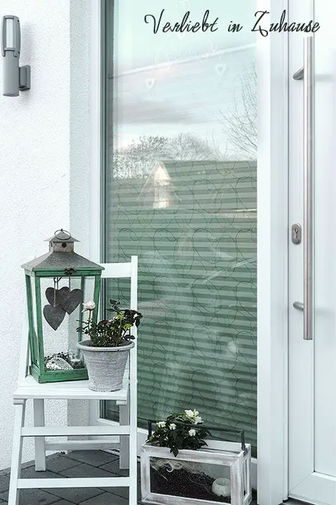 Traditional Entrance with Green Metal Lantern and Potted Plant — Winter Front Door Decor