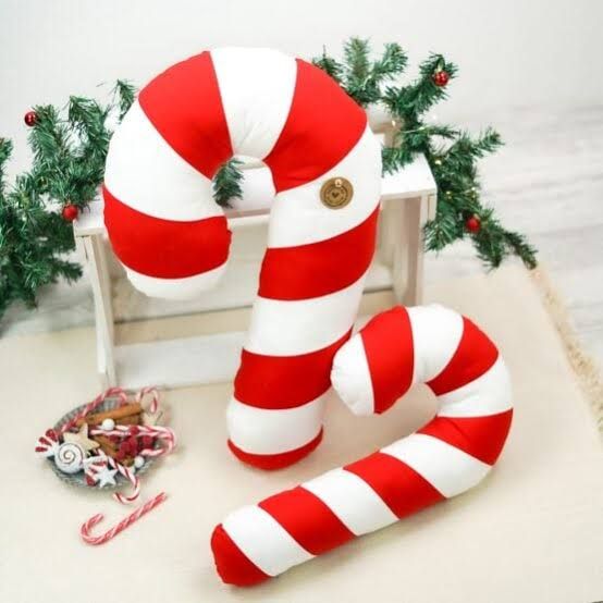 Whimsical Oversized Candy Cane Pillows Whimsical Oversized Candy Cane Pillows — Candy Cane Christmas Decor