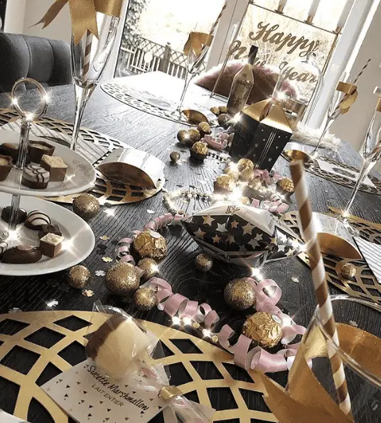 Glamorous Table with Chocolates and Sparkling Lights Glamorous Table with Chocolates and Sparkling Lights — New Years Eve Date Night at Home