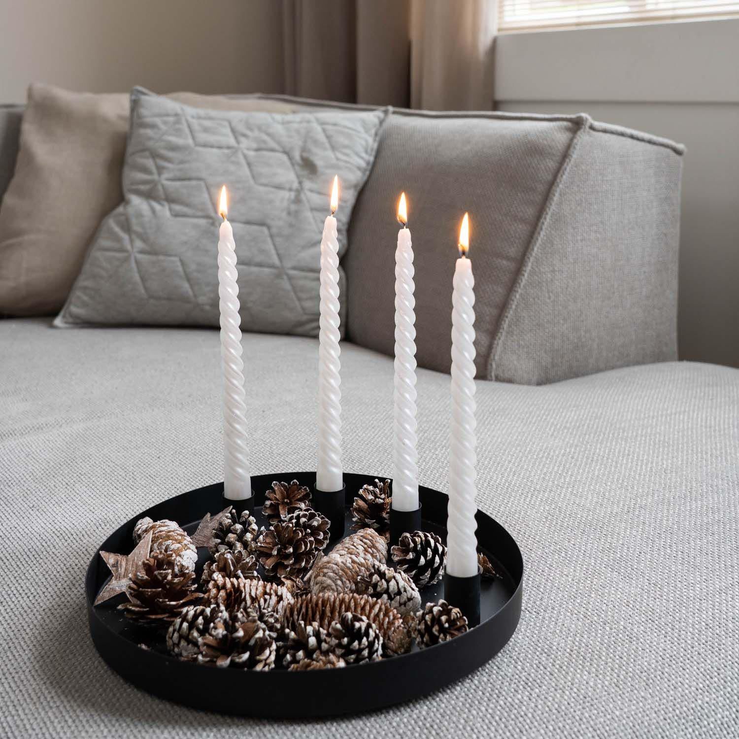 Modern Advent Wreath on a Black Tray with Pinecones Modern Advent Wreath on a Black Tray with Pinecones