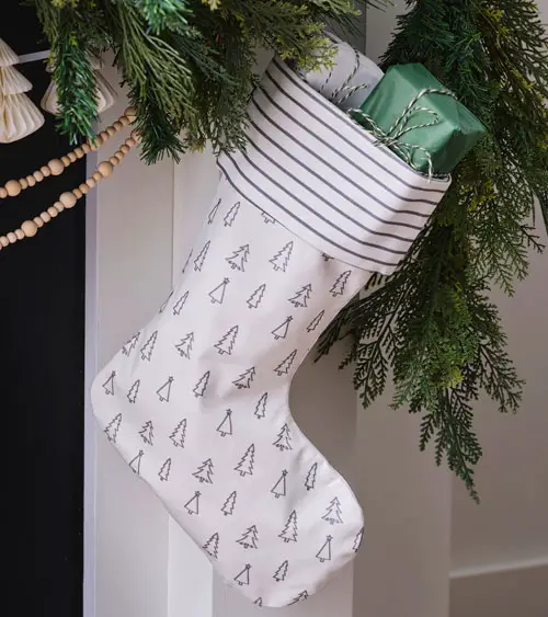 Festive Stocking Display Above a Traditional Fireplace — Christmas Stockings Display