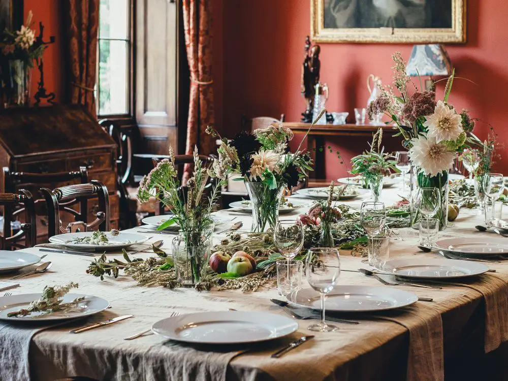 Traditional Dining Room with Abundant Floral Arrangements — New Years Eve Party 2027