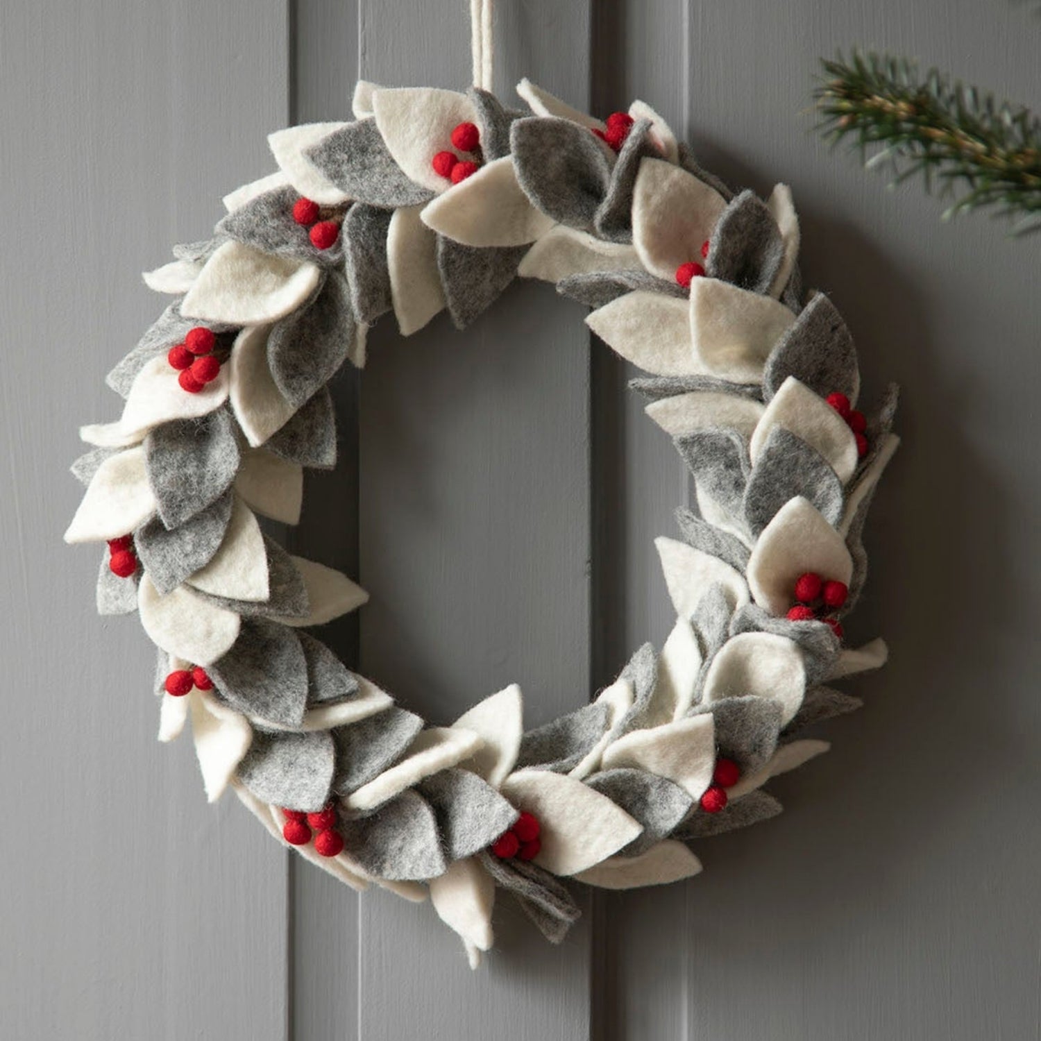 Modern Felt Wreath with Geometric Leaves and Red Berry Accents Modern Felt Wreath with Geometric Leaves and Red Berry Accents — Christmas Window Wreaths