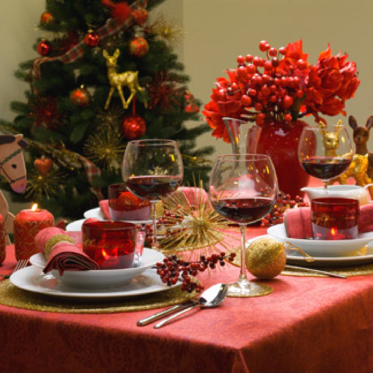 Traditional Red Tablecloth with Bold Floral Arrangement — Christmas Table Setting
