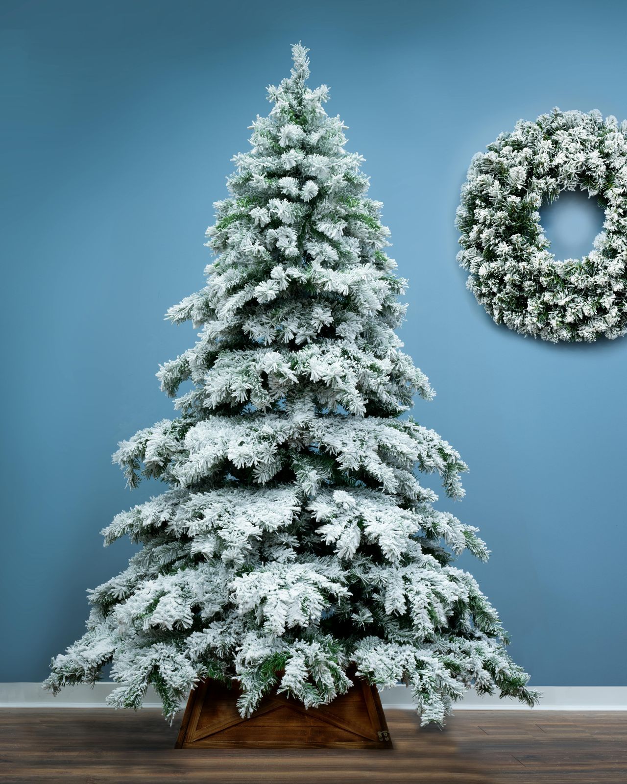 Minimalist Flocked Tree and Wreath in a Wooden Planter Box Minimalist Flocked Tree and Wreath in a Wooden Planter Box — Flocked Christmas Tree Decor