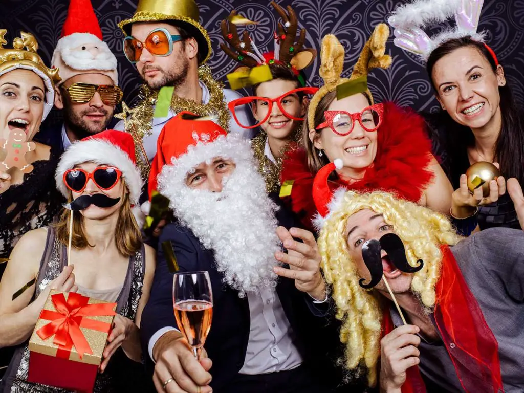 Festive Photobooth Backdrop with Costumed Guests — Christmas Party Backdrop