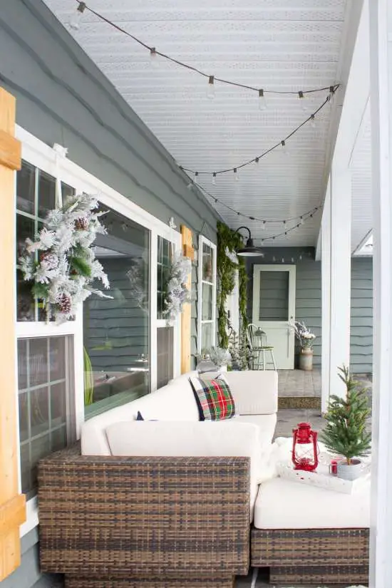 Cozy Farmhouse Porch Seating with Plaid Accents Cozy Farmhouse Porch Seating with Plaid Accents — Farmhouse Christmas Porch