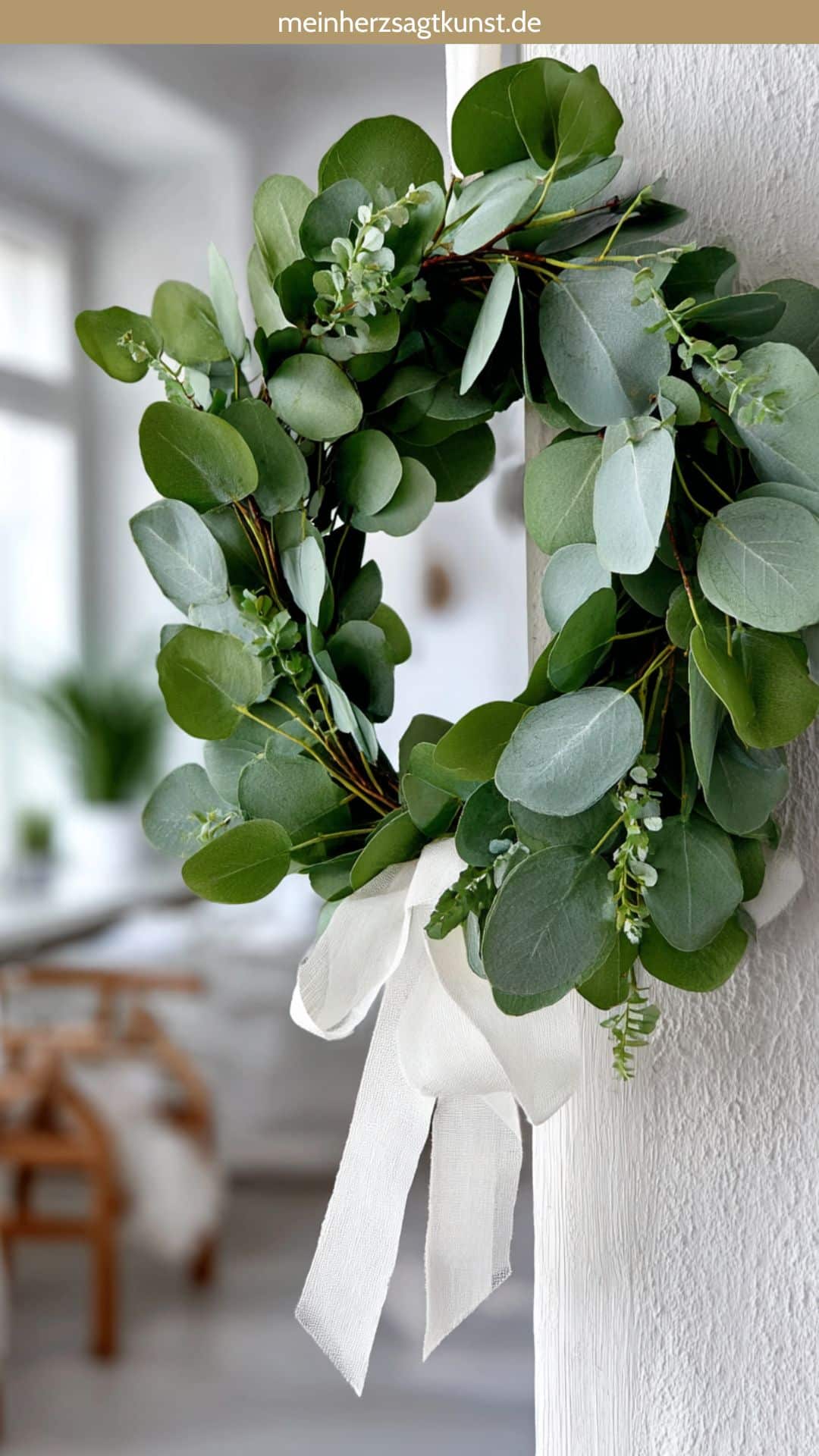 Minimalist Eucalyptus Wreath on a Textured White Door Minimalist Eucalyptus Wreath on a Textured White Door — Ornament Wreath