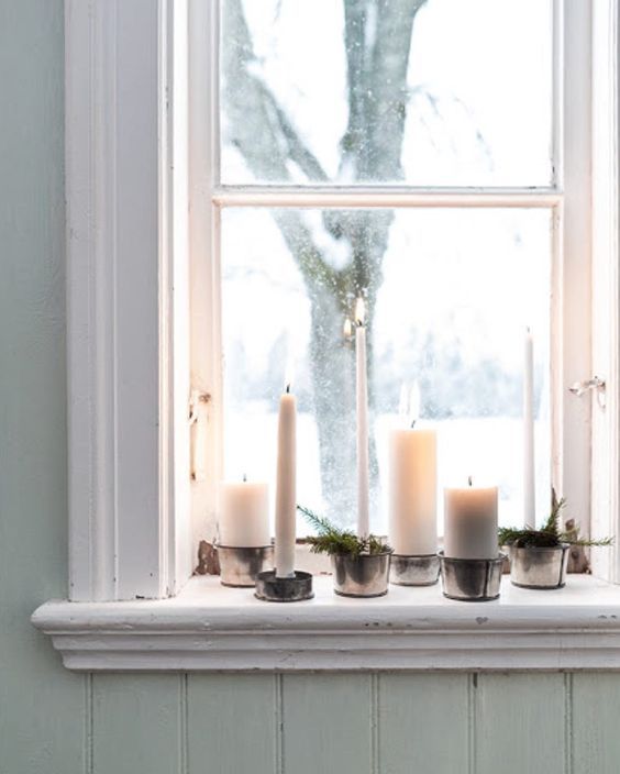 Minimalist White Candles with Pine Sprigs — Christmas Window Candles