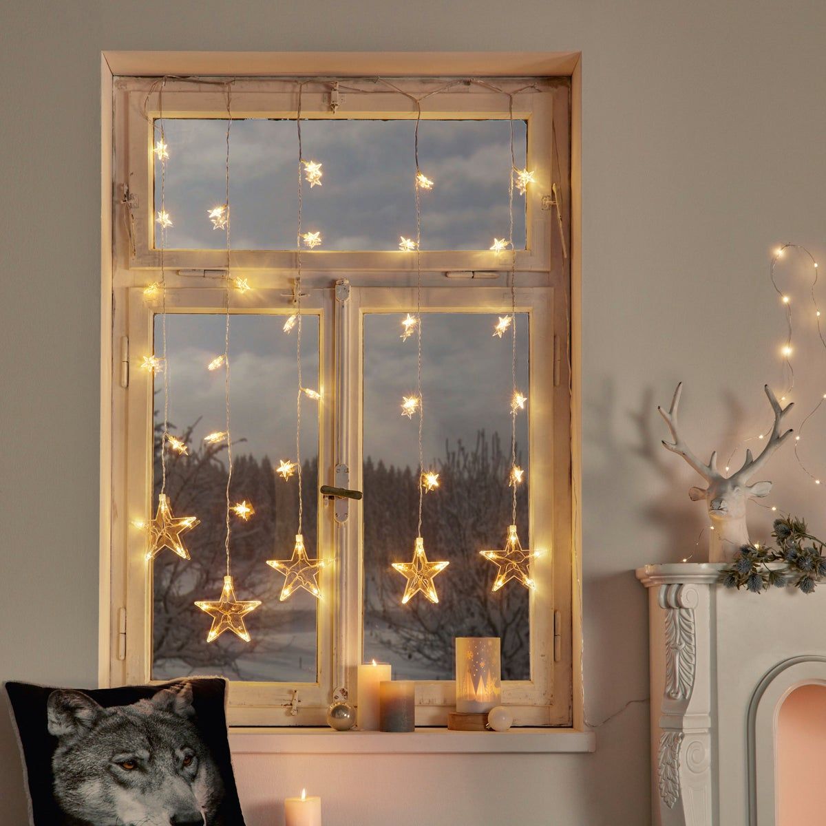 Cascading Star Fairy Lights on a Rustic Window — Christmas Fairy Lights Window