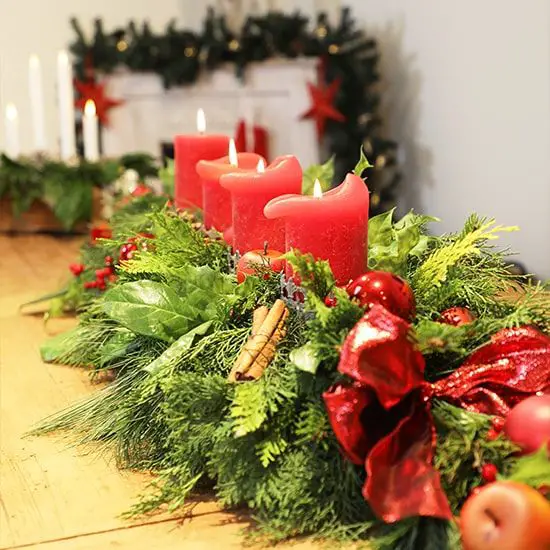 Abundant Traditional Garland Centerpiece with Red Bow Abundant Traditional Garland Centerpiece with Red Bow — Christmas Centerpiece