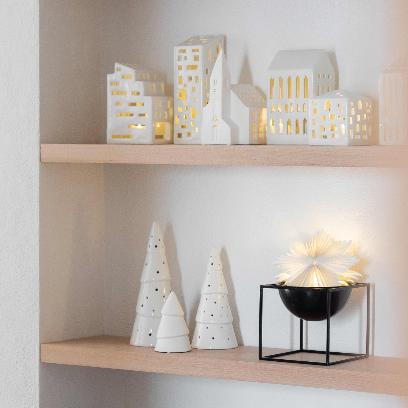 Modern White Village Houses on Light Wood Shelves Modern White Village Houses on Light Wood Shelves — Christmas Bookshelf Decor