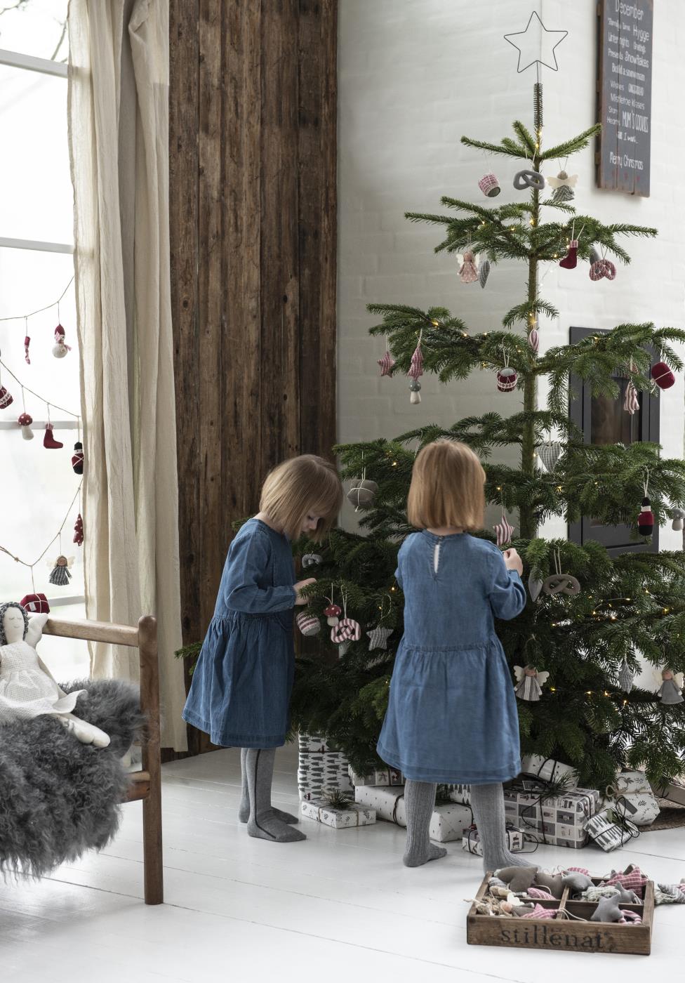 Children Decorating a Scandinavian Christmas Tree Children Decorating a Scandinavian Christmas Tree