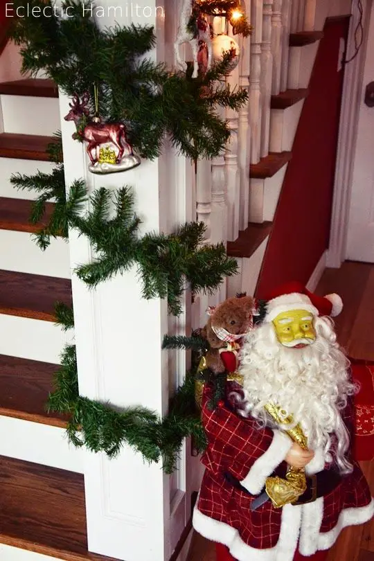 Traditional Staircase with Whimsical Santa and Reindeer Accents — Christmas Staircase Decor