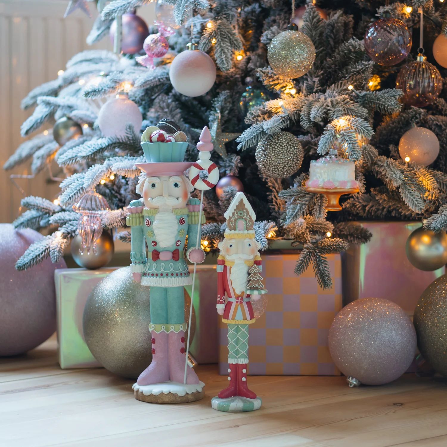 Festive Nutcrackers Before a Flocked Christmas Tree — Nutcracker Display