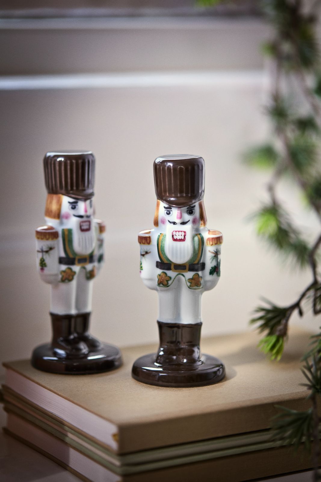 Ceramic Nutcracker Figures on a Stack of Books — Nutcracker Display