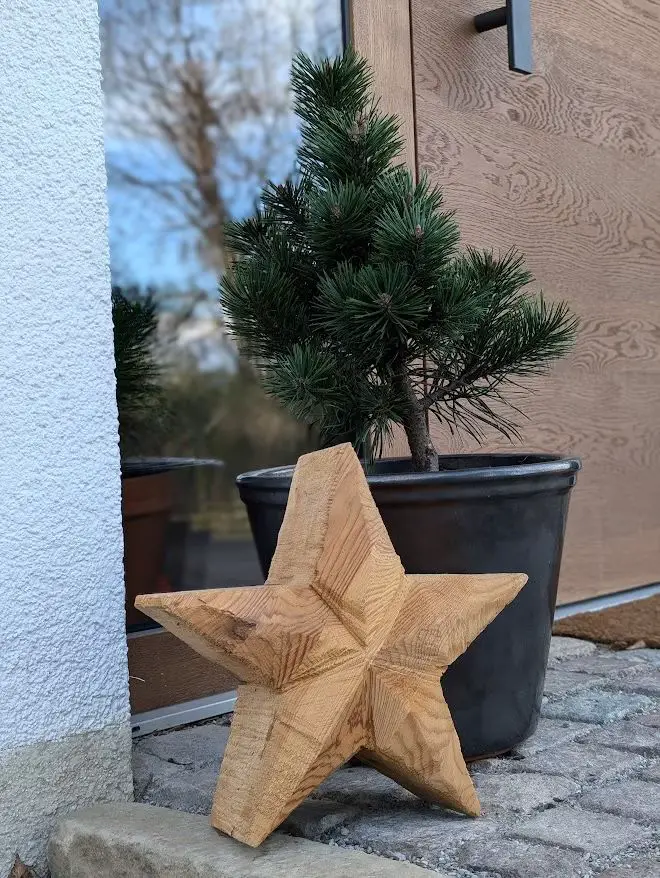Rustic Wooden Star Decor on a Stone Doorstep Rustic Wooden Star Decor on a Stone Doorstep — Christmas Decor