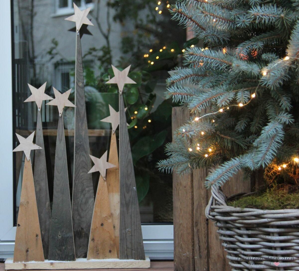 Grouping On A Surface Rustic Geometric Wooden Christmas Trees Outdoors — DIY Christmas Decor