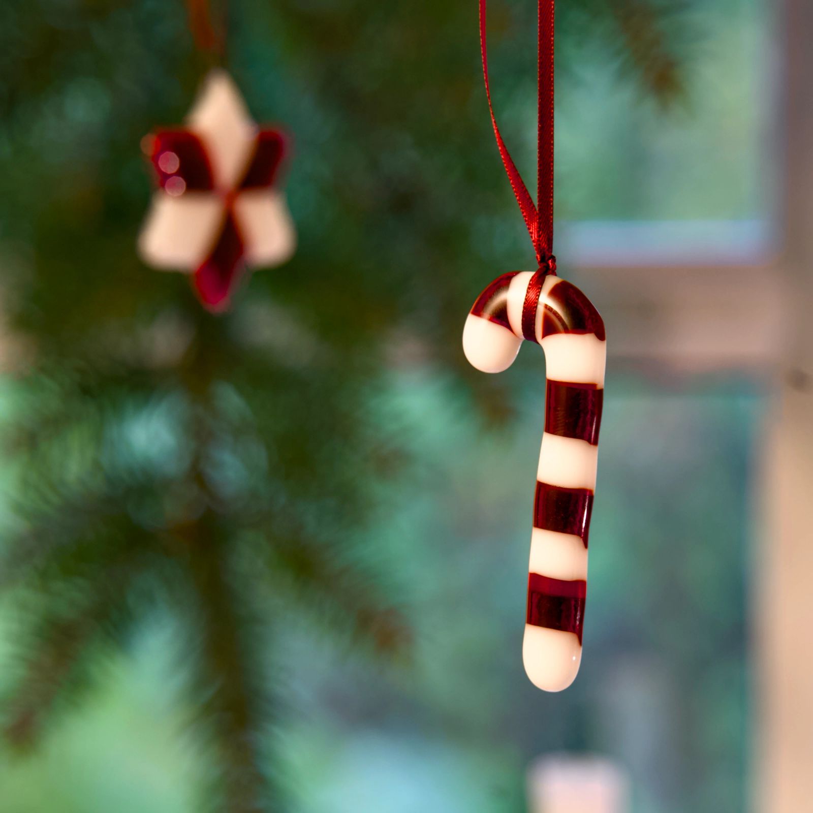 Shiny Glass Candy Cane Ornament Reflection Shiny Glass Candy Cane Ornament Reflection — Candy Cane Christmas Decor