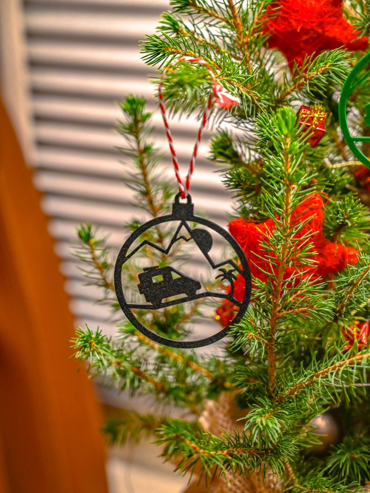 Christmas Tree Branch with Vanlife Silhouette Ornament — Christmas Tree Themes