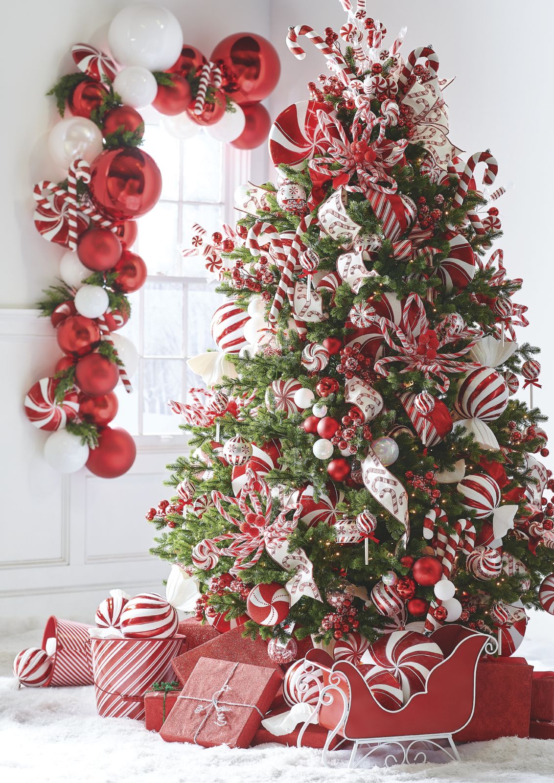 Festive Christmas Tree with a Red and White Candy Cane Theme — Christmas Tree Themes