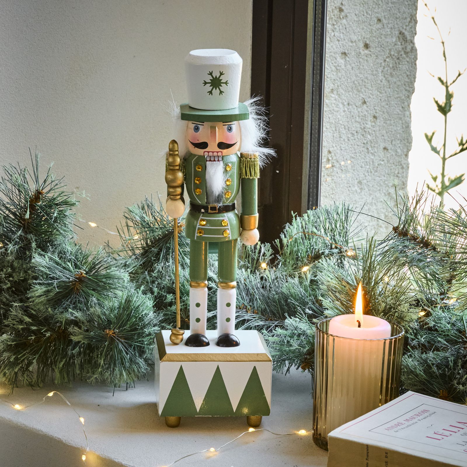Traditional Shelf Display with Nutcracker and Pine Garland — Christmas Bathroom Decor